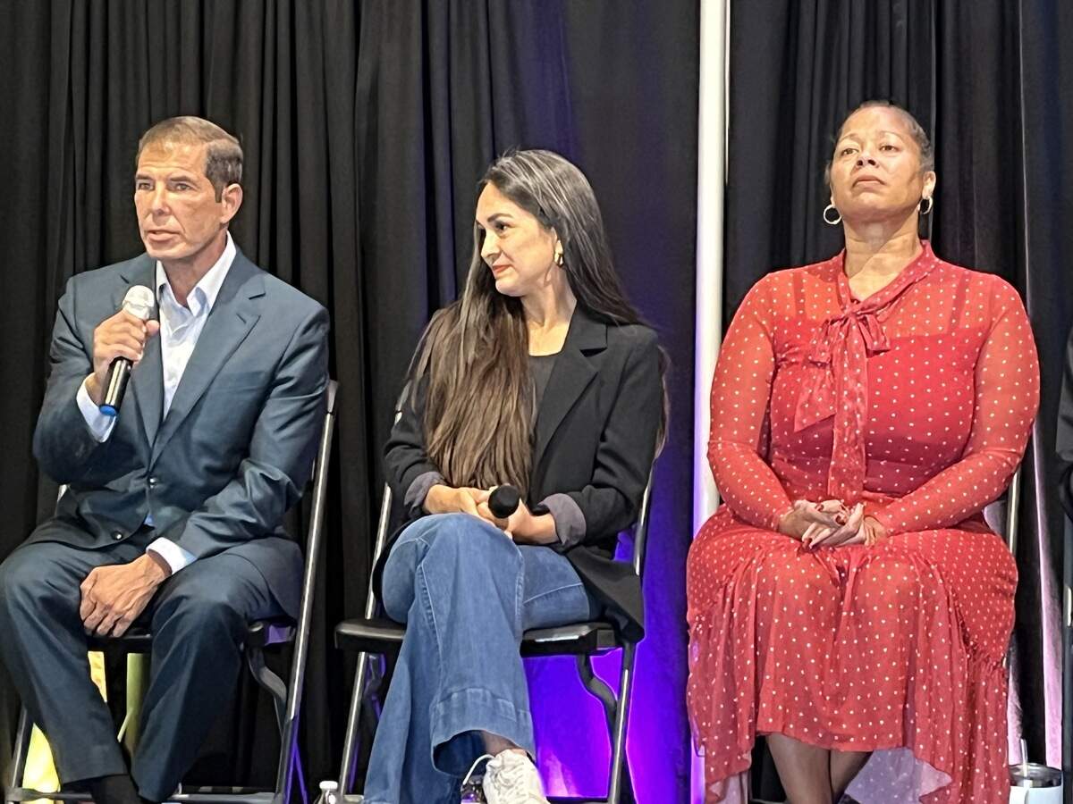 Fresno City Council District 3 candidate Joaquin Arambula, left, answers a question, as District 1 candidate Ariana Martinez Lott and District 3 candidate Keshia Thomas listen. A candidate forum took place Sept. 22, 2026, at Dulce Upfront in Fresno.